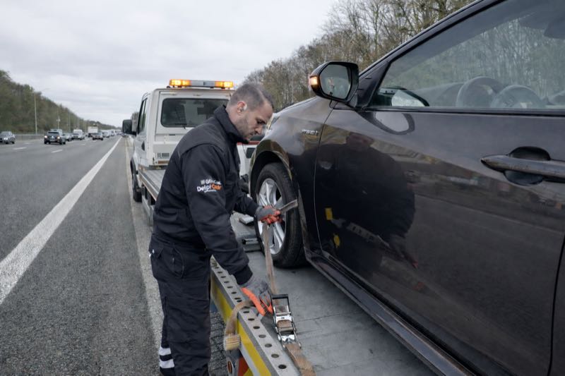Arrimage véhicule sangles plateau autoroute Bruxelles HELPCAR
